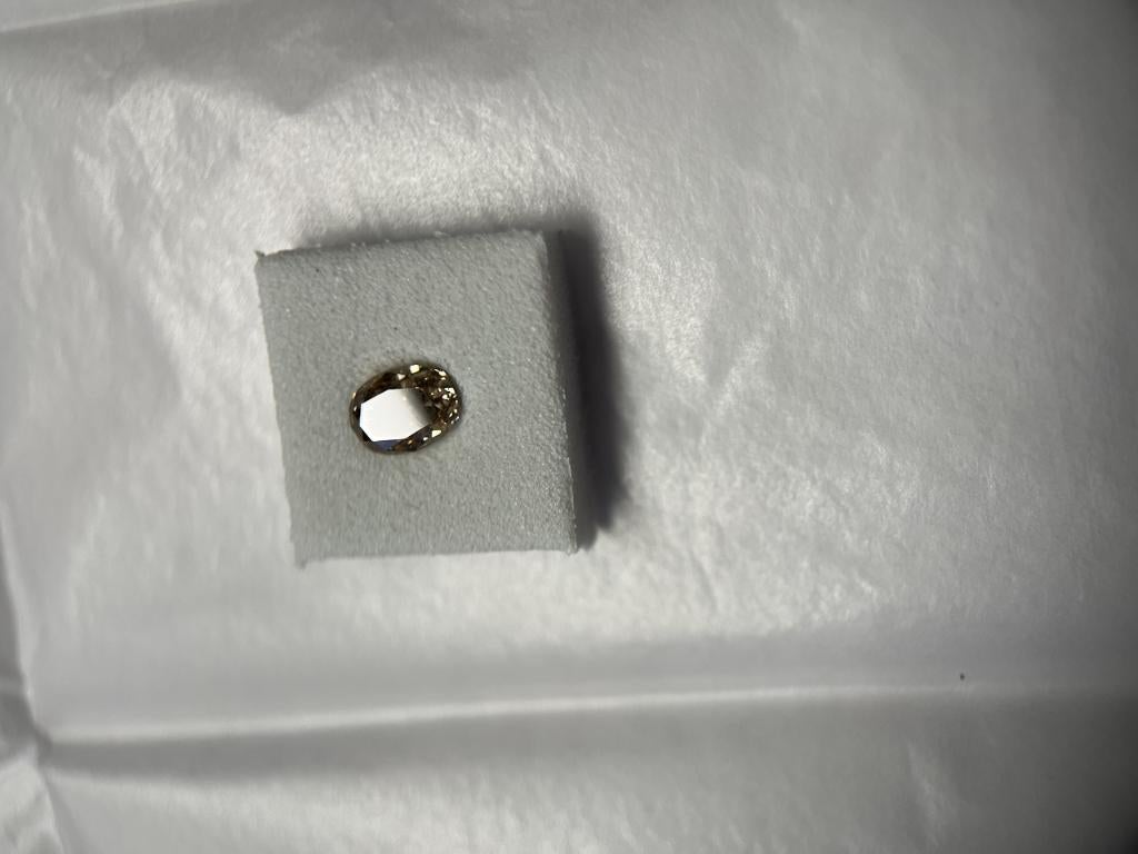 Natural diamond oval brilliant-cut 0,65 ct (67), Ophalen of Verzenden, Zo goed als nieuw