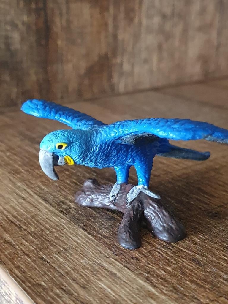 Schleich Blauwe Ara op boomstam, Ophalen of Verzenden, Zo goed als nieuw