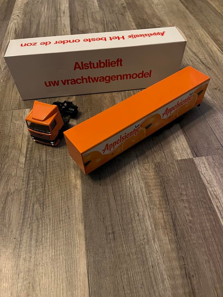 Appelsientje vrachtwagen model met originele verpakking, Hobby en Vrije tijd, Modelbouw | Auto's en Voertuigen, Ophalen of Verzenden