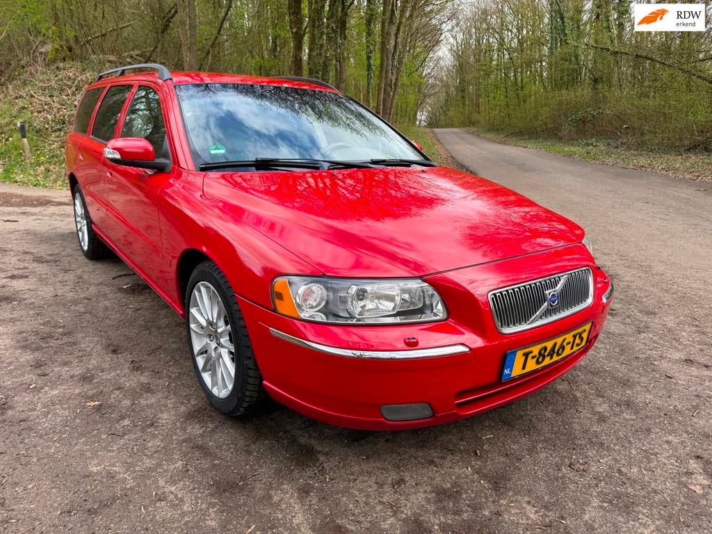 Volvo V70 2.4 Bi Fuel LPG Xenon/Leder/Navigatie/Nwe APK., Auto's, Volvo, 1651 kg, Stoelverwarming, 2435 cc, Grijs