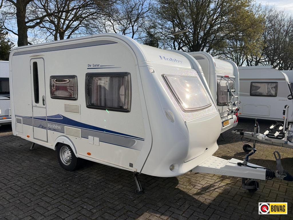 Hobby De Luxe 400 SF Voortent/Luifel/Fietsdr., Caravans en Kamperen, Caravans, Hobby, Bedrijf, Treinzit, 750 - 1000 kg