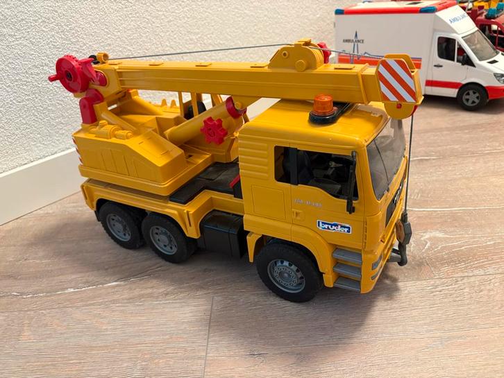 Bruder MAN Kraanwagen 1:16 met licht, Kinderen en Baby's, Speelgoed | Speelgoedvoertuigen, Zo goed als nieuw, Ophalen of Verzenden