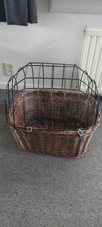 Hondenmand voor op de fiets, Ophalen