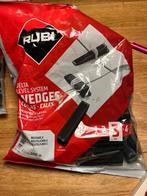Rubi: wedges en strip systeem. 1x gebruikt, Doe-het-zelf en Verbouw, Tegels, Wandtegels, Minder dan 5 m², Overige materialen, 60 cm of meer