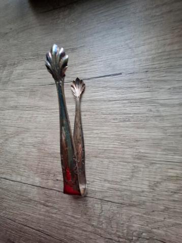 Antieke vintage oude decoratieve suikertang   beschikbaar voor biedingen