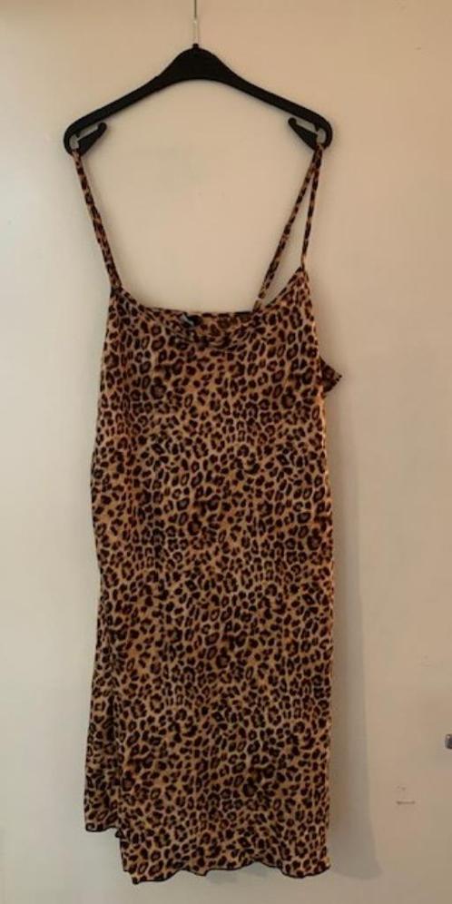 Bruin/zwarte topje. Merkloos. Maat M, Kleding | Dames, Tops, Zo goed als nieuw, Maat 38/40 (M), Bruin, Zonder mouw, Ophalen of Verzenden