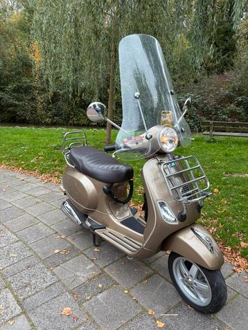 Vespa LX50 4T blauw kenteken - goede staat met lakschade beschikbaar voor biedingen