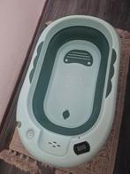 Inklapbare baby bad, Ophalen