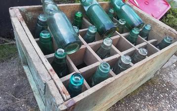 24 kogelflesjes met originele krat beschikbaar voor biedingen