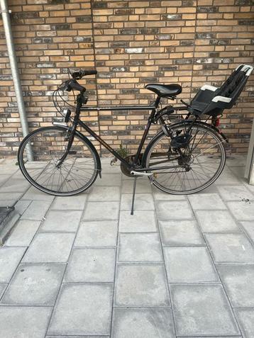 Batavus fiets met kinderzitje te koop beschikbaar voor biedingen