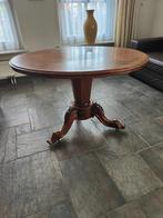 Antieke ovale tafel, Ophalen