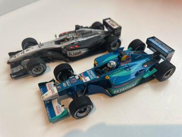 Aangeboden: 2 x Kimi Raikkonen Minichamps  1/43. beschikbaar voor biedingen