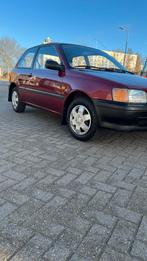Toyota Starlet 1.3 XLI AUT E2 1993 Rood, Auto's, Toyota, 74 pk, 4 cilinders, Starlet, 400 kg