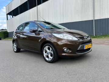 Ford Fiesta 1.4 Ghia Stoelverwarming/Bluetooth/Airco/Pdc beschikbaar voor biedingen