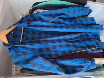 Blauwe geruite blouse beschikbaar voor biedingen
