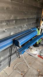 Twee elektrisch bedienbare rolluiken blauw, Ophalen of Verzenden, Gebruikt