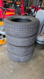 Bridgestone dueller AT 265/65/17 €110 per band, Ophalen, Zo goed als nieuw