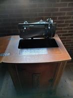 Singer elektrische naaimachine, Ophalen