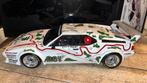 BMW Motorsport M1 Stuck/Piquet Minichamps 1:12, Ophalen of Verzenden, Zo goed als nieuw, 1:9 t/m 1:12, Auto