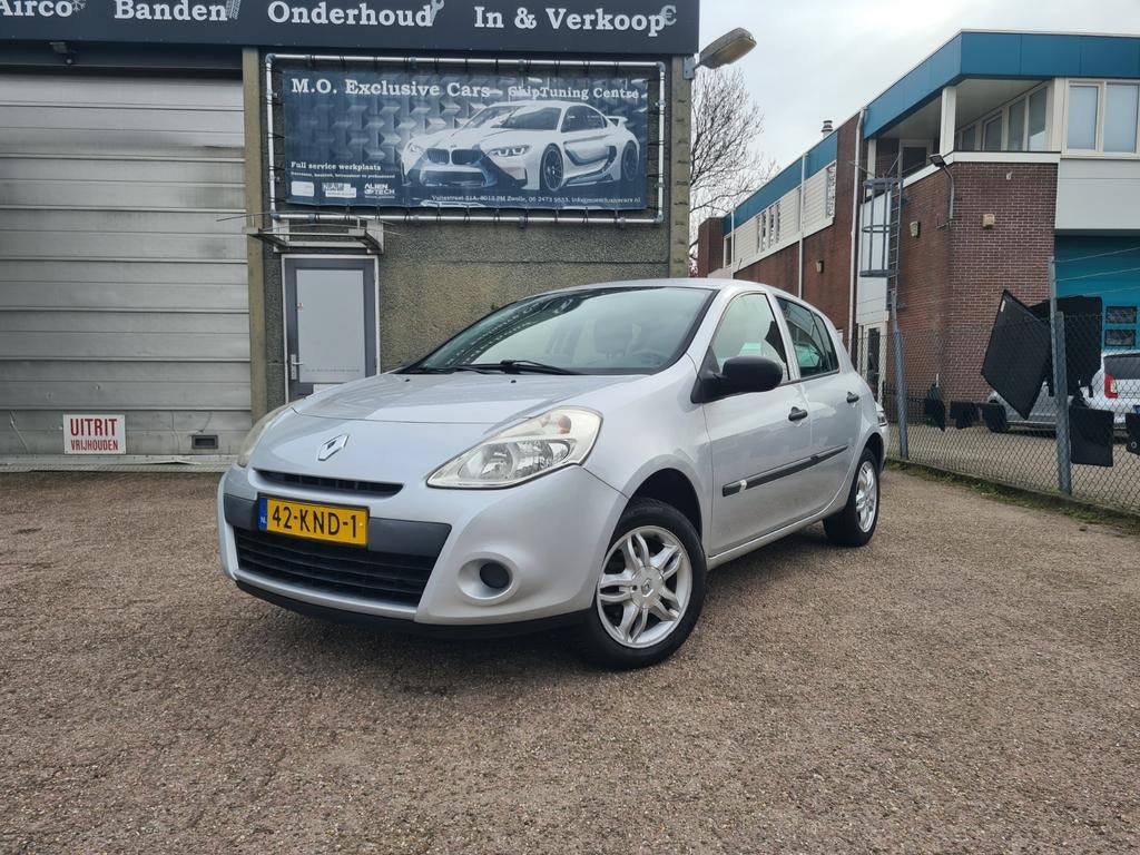 Renault Clio 1.2 16V 55KW 5-DRS E4 2010 Grijs Airco, Voorwielaandrijving, 74 pk, Zwart, 4 cilinders