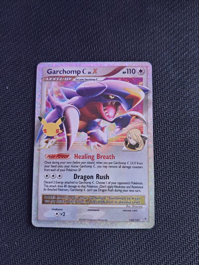 Garchomp [C] LV.X (CEL SV 145), Ophalen of Verzenden, Nieuw, Losse kaart, Foil