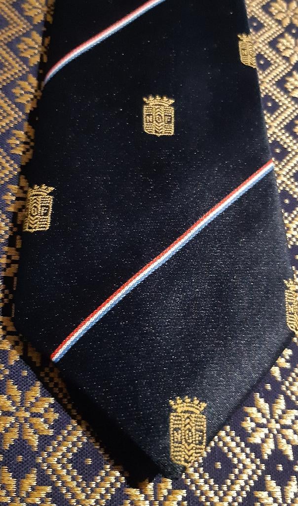 NOF Nederlandse Olie Fabriek Delft stropdas bekend van Calve, Ophalen of Verzenden, Nieuw, Gebruiksvoorwerp