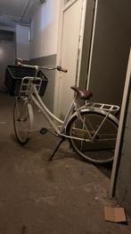 Damesfiets met krat, Ophalen