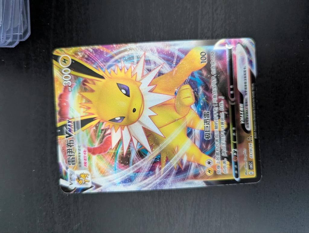 Jolteon VMAX Pokémon kaart - Near Mint, Hobby en Vrije tijd, Verzamelkaartspellen | Pokémon, Ophalen of Verzenden, Zo goed als nieuw