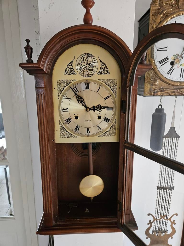 Antieke Tempus Wandklok, Ophalen