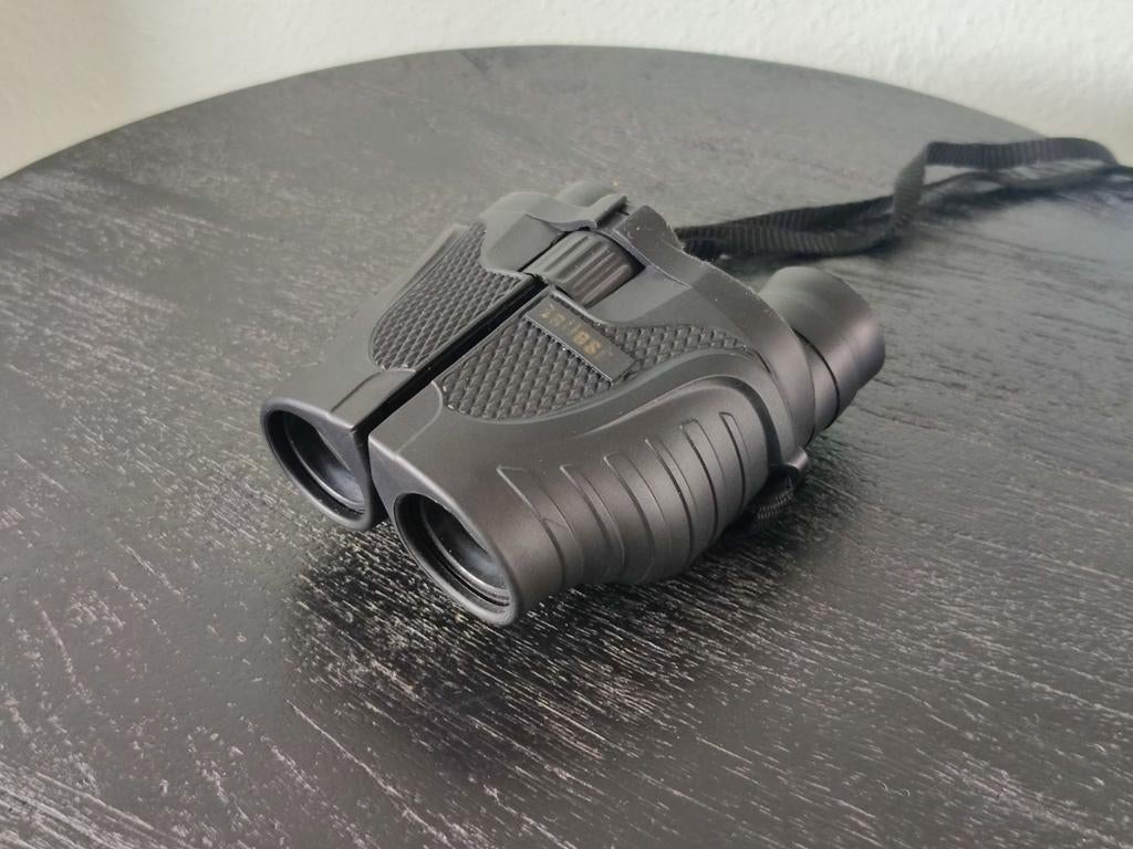 Te koop: compacte verrekijker 10 x 25 met zoom functie, Audio, Tv en Foto, Ophalen of Verzenden, Zo goed als nieuw, 8 tot 12x