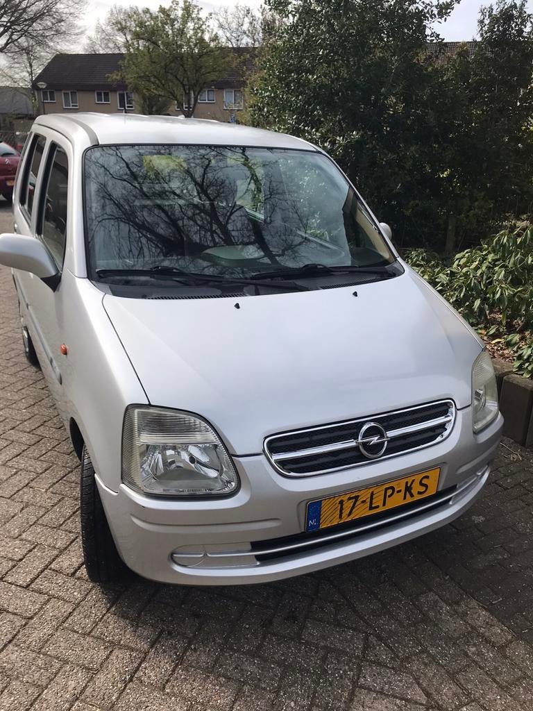Opel Agila 1.2 I 16V 2003 Grijs, Auto's, Voorwielaandrijving, 15 km/l, Origineel Nederlands, Handgeschakeld