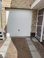 Garagedeur vervangen: kanteldeur naar openslaande deuren., Kunststof, Ophalen of Verzenden, 120 cm of meer, 215 cm of meer