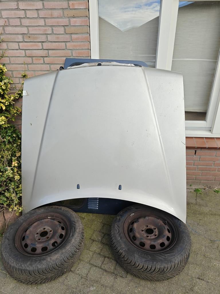 W124 nette motorkap kleur 702H, Ophalen