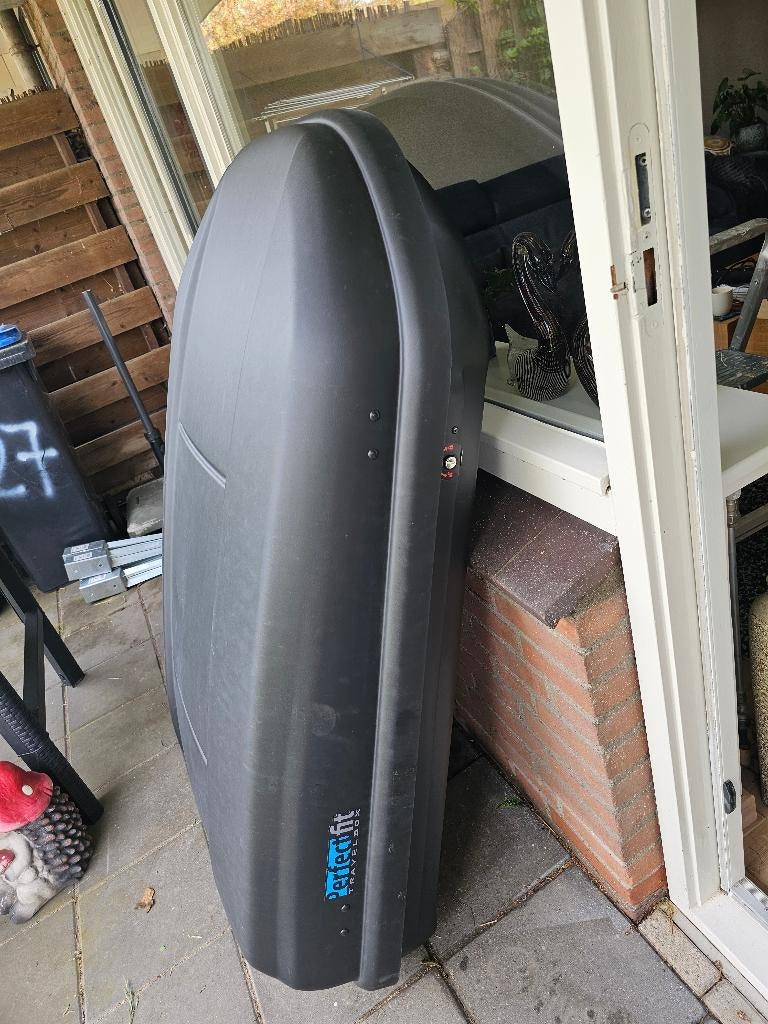 Dakkoffer met dakrails, Ophalen