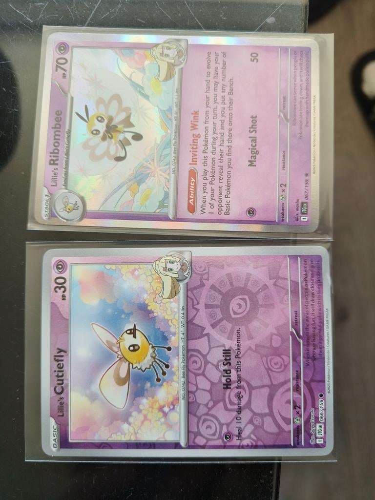 Lillie's Cutiefly & Ribombee Evolutie Lijn NM (Holo/Reverse), Ophalen of Verzenden, Zo goed als nieuw, Meerdere kaarten, Foil