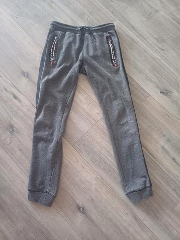 Sweatpants/joggingbroek donkergrijs met zwarte bies beschikbaar voor biedingen