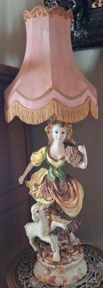 Porseleinen beeld met lamp, Ophalen