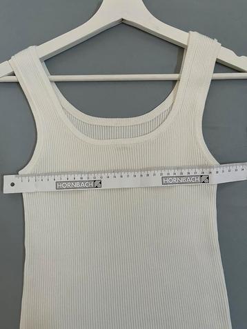 Super mooi rib top hempje room wit 36/38 beschikbaar voor biedingen