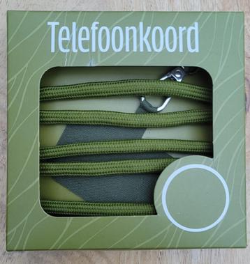 Telefoonkoord in de kleur (leger)groen beschikbaar voor biedingen