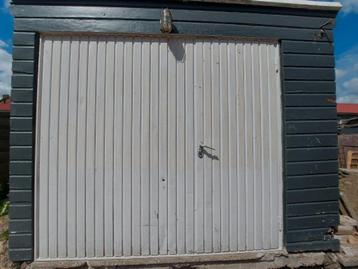 Te Koop gebruikte elektrische garage deur  beschikbaar voor biedingen