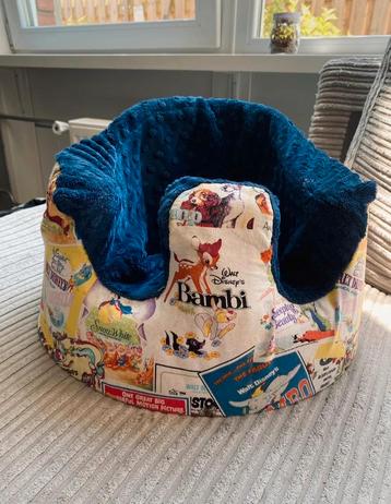 Bumbo zitje met disney hoes.  beschikbaar voor biedingen