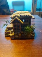 Sushi bar huisje, Ophalen