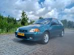 Subaru Justy 1.3 GX 4WD 1997 Groen, Auto's, 4 cilinders, 68 pk, Origineel Nederlands, Handgeschakeld