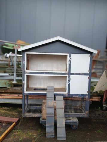 Groot konijnenhok (gebruikt) + grote ren (in goede staat) beschikbaar voor biedingen