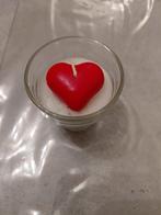 Kaars met hartje in glas, Ophalen