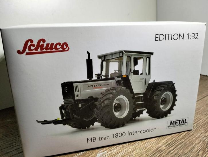 Te koop Schuco MB-Trac 1800 Intercooler zwart/zilver model., Hobby en Vrije tijd, Modelauto's | 1:32, Zo goed als nieuw, Tractor of Landbouw