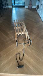 Houten slee, Ophalen, Gebruikt