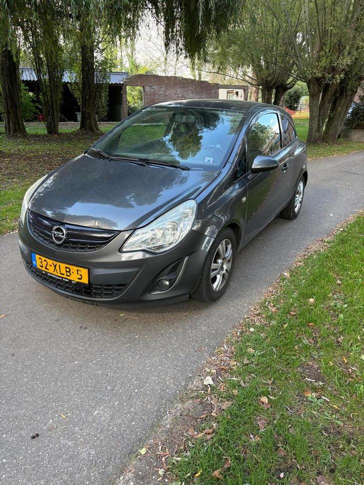 Opel Corsa 1.2 16V LPG 3D 2012 Grijs, Auto's, Opel, Particulier, Corsa, ABS, Airbags, Cruise Control, Elektrische ramen, Lichtmetalen velgen