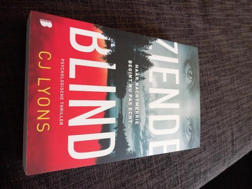 Ziende blind - C.J. Lyons, Boeken, Thrillers, Zo goed als nieuw, Amerika, Ophalen of Verzenden