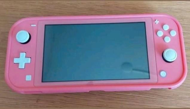 Nintendo Switch Lite. Zgan. 3x op gespeeld., Spelcomputers en Games, Spelcomputers | Nintendo Switch Lite, Zo goed als nieuw, Roze of Coral